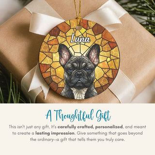 Decorative ornament with a dog illustration and 'Luna' text, tied to a gift box with a ribbon.