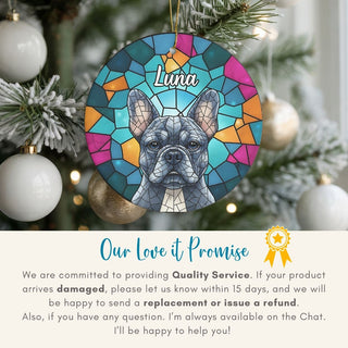 Decorative ornament with a dog design and 'Luna' text, hanging on a Christmas tree.