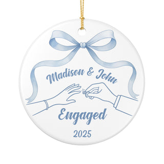 Personalized ceramic ornament with hand illustration showing engagement proposal and bow design, perfect engaged couple gift.