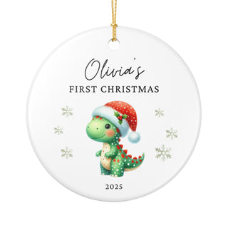 adorable little donosaurus baby first christmas ornament featuring cute dinosaur in santa hat and scarf, personalized ceramic decoration for newborn gift