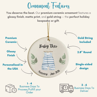 Ceramic ornament with baby design and text, featuring gold string and glossy finish.