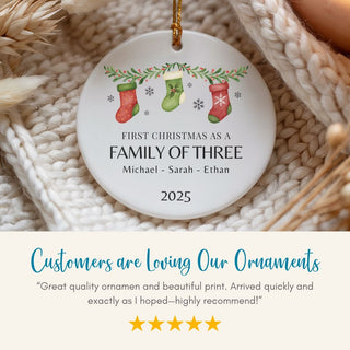Personalized Christmas ornament with stockings design on a textured surface, featuring text and customer review.