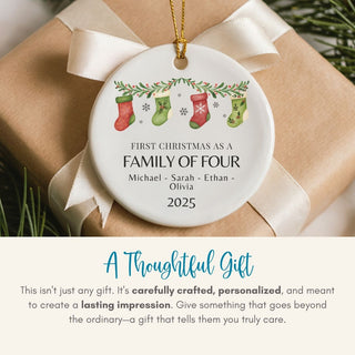 Personalized Christmas ornament on a gift with text about being a family of four.